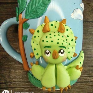 Mug decorated in porcelain cold. Handmade 100%.